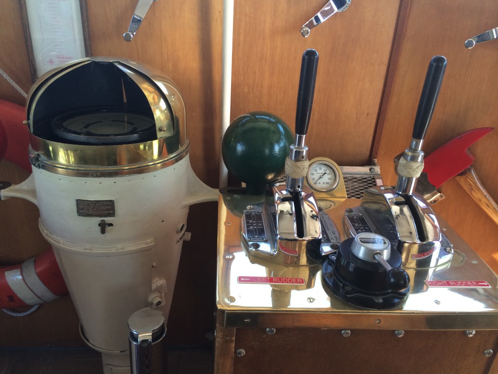 The wood-paneled wheelhouse on the Potomac features more original material than any other room on the boat.