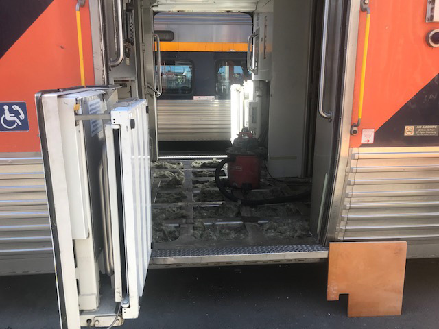 Worker on Capitol Corridor train